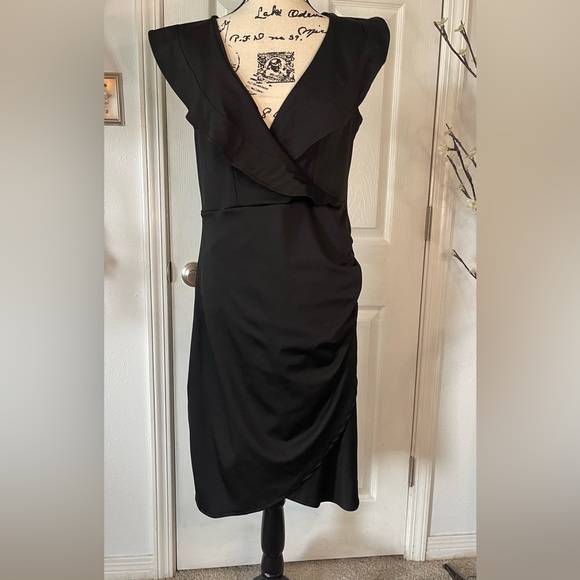 Dresses & Skirts - Lovely Black Dress with Deep V Neckline and ruffle around Collar, Sexy Chic!